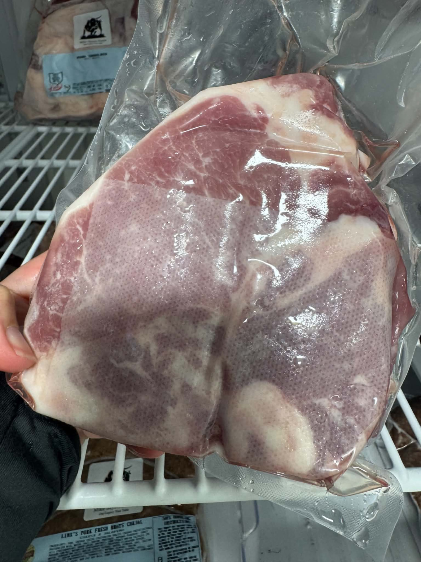 Vacuum-packed pork cut ready for pickup