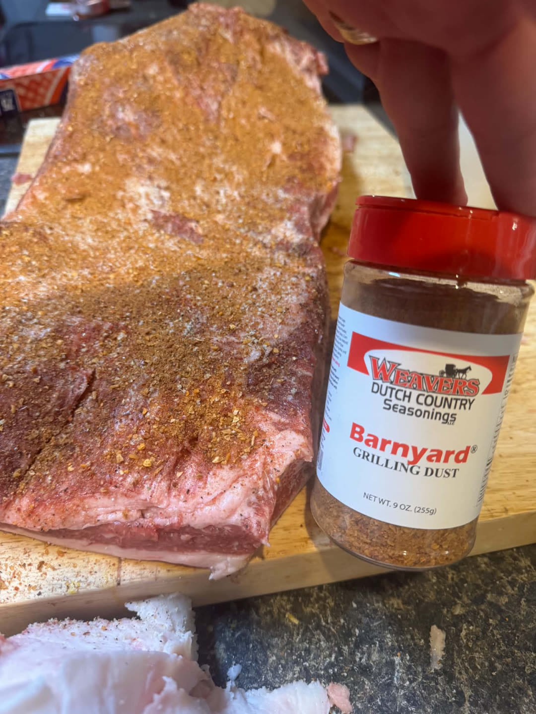 Seasoned pork ready for the smoker